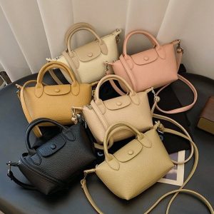 PU Dumpling Crossbody Bag with Magnetic Closure and Stitching