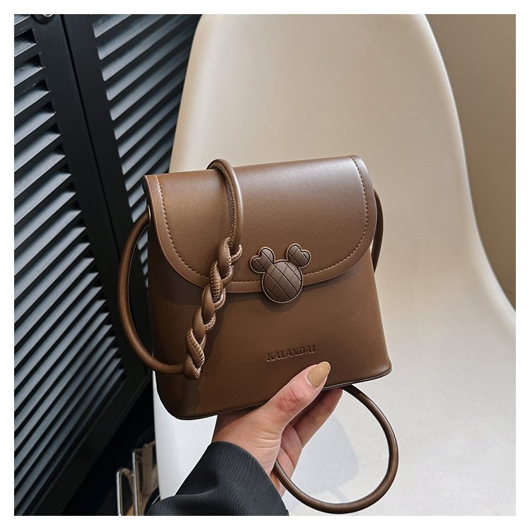 2025 Spring PU Bucket Bag with Stitching and Flap Closure